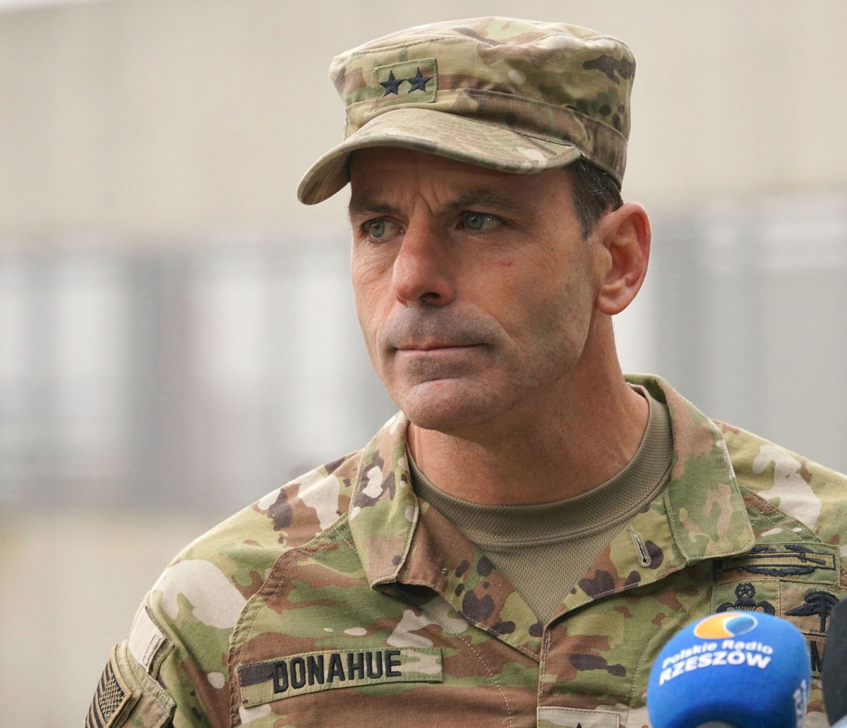 <i>Janek Skarzynski/AFP/Getty Images via CNN Newsource</i><br/>Christopher Donahue speaks to journalists after a US Air Force transport plane transporting military equipment and troops arrived at the Rzeszow-Jasionka airport in southeastern Poland in February 2022.