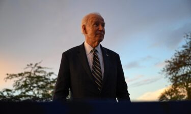 President Joe Biden speaks to the press during his visit to the National Slavery Museum in Morro da Cruz