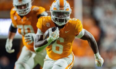 Tennessee's Dylan Sampson (No. 6) runs in a game against the Florida Gators in October.