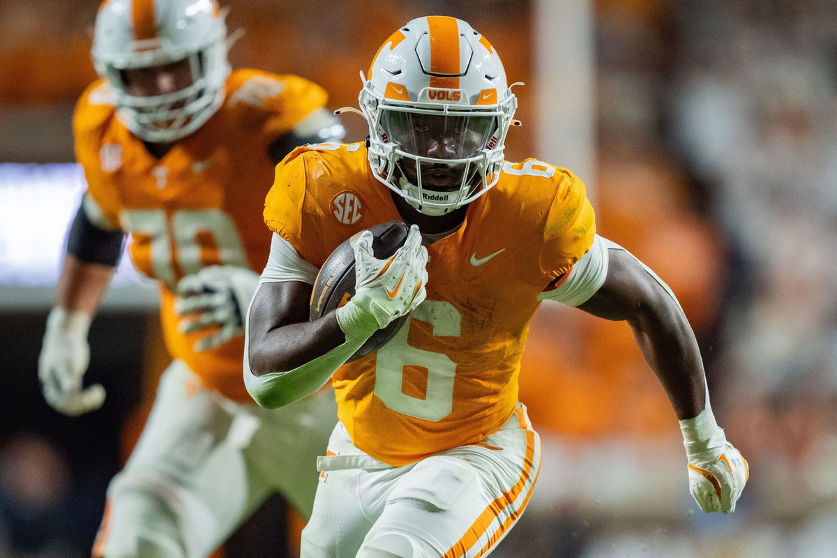 <i>Jacob Kupferman/Getty Images via CNN Newsource</i><br/>Tennessee's Dylan Sampson (No. 6) runs in a game against the Florida Gators in October.