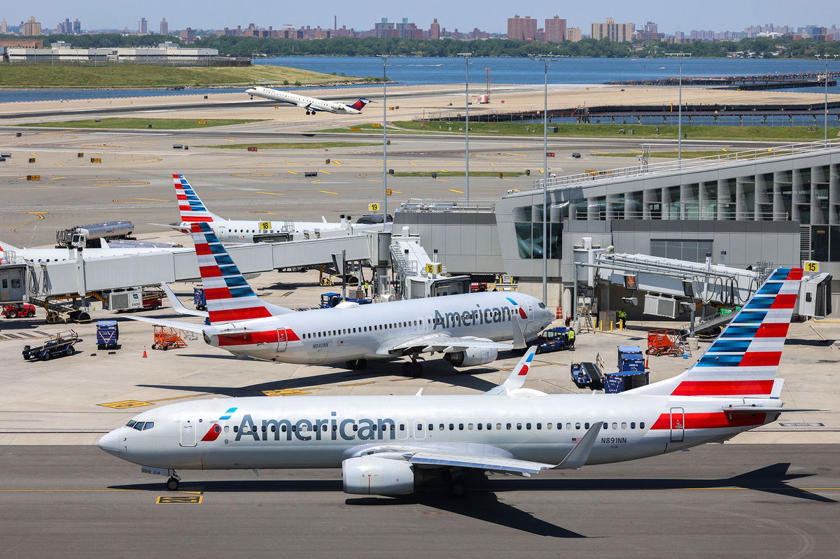 <i>Charly Triballeau/AFP/Getty Images/FILE via CNN Newsource</i><br/>American Airlines aircrafts are pictured on the tarmac at LaGuardia Airport in Queens