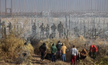 Migrants near the Rio Grande along the US-Mexico border in Juarez