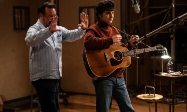 Director James Mangold and Timothée Chalamet on the set of "A Complete Unknown."