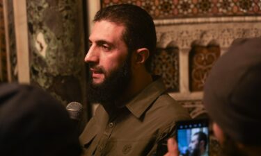 Ahmad al-Sharaa speaks at the Umayyad Mosque in Damascus on December 8.