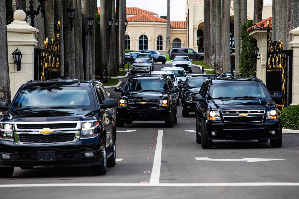 <i>Saul Martinez/Getty Images via CNN Newsource</i><br/>President-elect Donald Trump is driven from the Trump International Golf Club in a convoy of vehicles on December 20