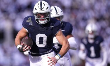 Dominic DeLuca of the Penn State Nittany Lions intercepts a pass and returns it for a touchdown during the first quarter against the Southern Methodist Mustangs.