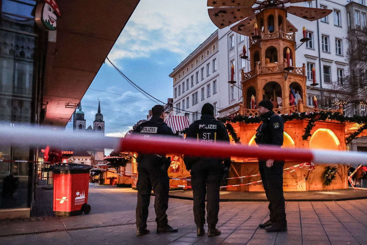 <i>Filip Singer/EPA-EFE/Shutterstock via CNN Newsource</i><br/>Police patrol next to the targeted Christmas market in Magdeburg