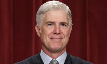 United States Supreme Court Associate Justice Neil Gorsuch poses for an official portrait at the East Conference Room of the Supreme Court building on October 7