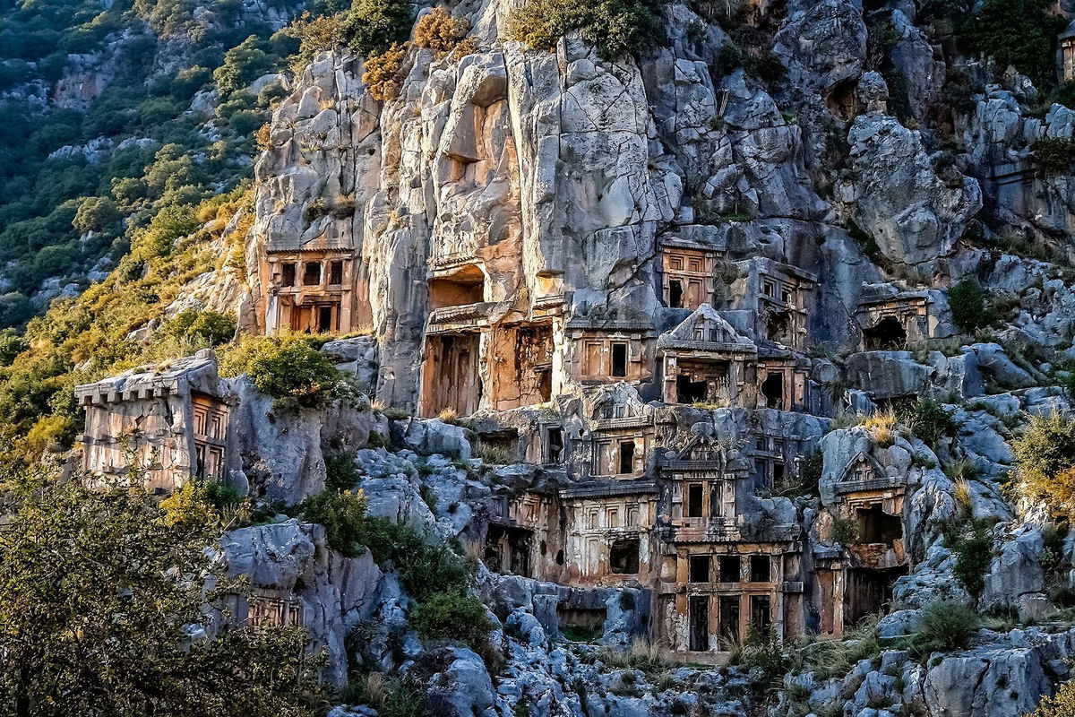 <i>iStockphoto/Getty Images via CNN Newsource</i><br/>A cascade of rock-cut tombs sits above the ancient city of Myra.