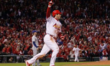 Then St. Louis Cardinals third baseman David Freese celebrates his game-winning home run in the 11th inning of Game 6 the World Series on October 27