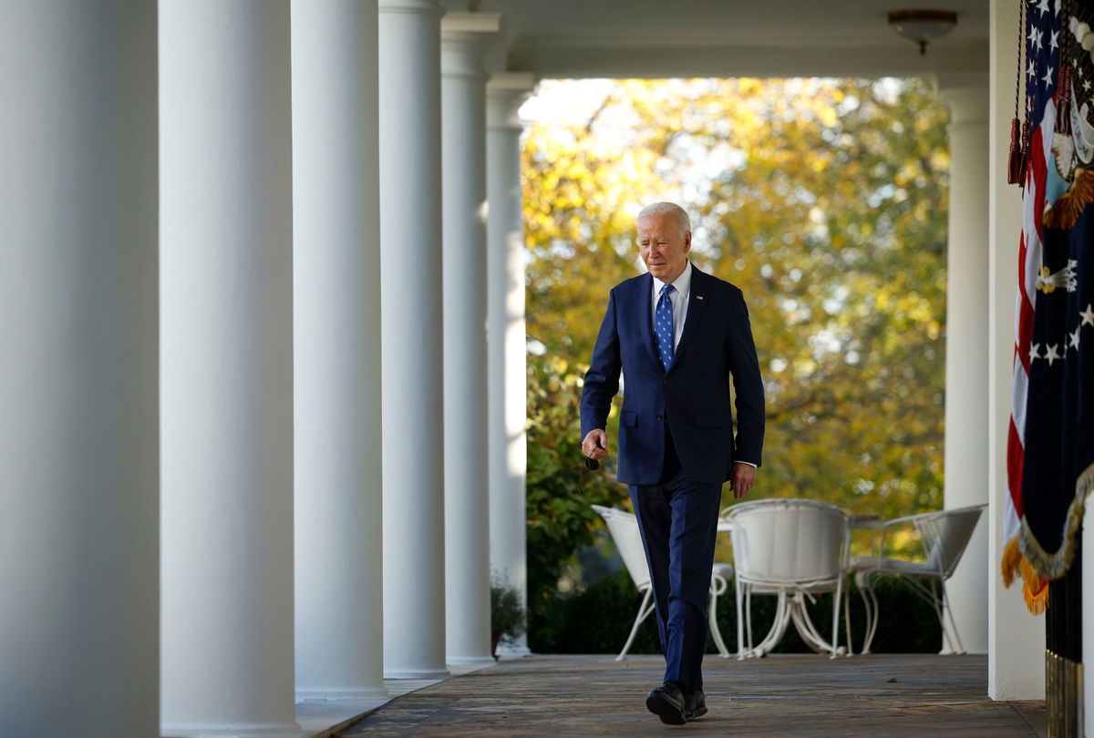 <i>Kevin Dietsch/Getty Images via CNN Newsource</i><br/>President Joe Biden walks to the Rose Garden to deliver remarks at the White House on November 26.