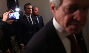 Pete Hegseth leaves a meeting with U.S. Sen. Joni Ernst (R-IA) at the U.S. Capitol on December 4 in Washington