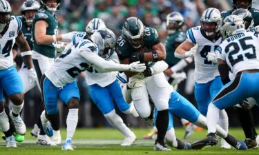 Barkley (center) leads the league in rushing through Week 14.