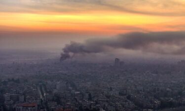 Smoke billows following Israeli airstrikes in Damascus on December 10.