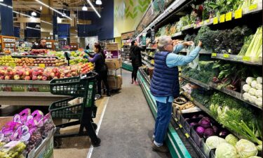 Customers shop at a grocery store in Chicago on October 25. Inflation heated back up again in November.