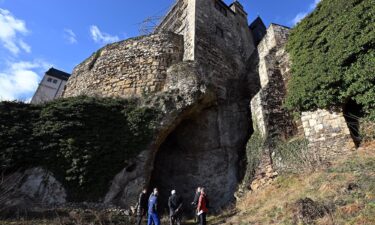 The cave where the ancient human remains were found is located beneath a castle in Ranis