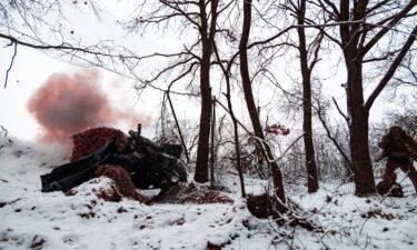 A Ukrainian soldier during combat work with M101 howitzer on December 6 in Kharkiv