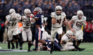 Then-Army quarterback Christian Anderson runs for a touchdown against Navy during the first half of the Army-Navy game in December 2021.