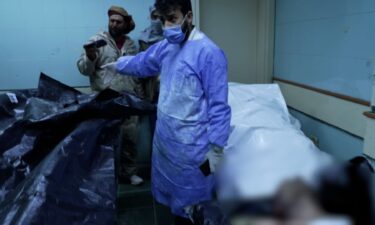 Battered bodies inside the morgue of Mujtahid Hospital. A blur has been added.