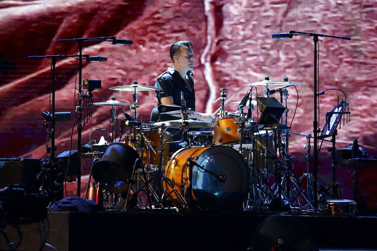 <i>Suhaimi Abdullah/Getty Images via CNN Newsource</i><br/>Larry Mullen Jr. of U2 performs at the National Stadium in Singapore on November 30