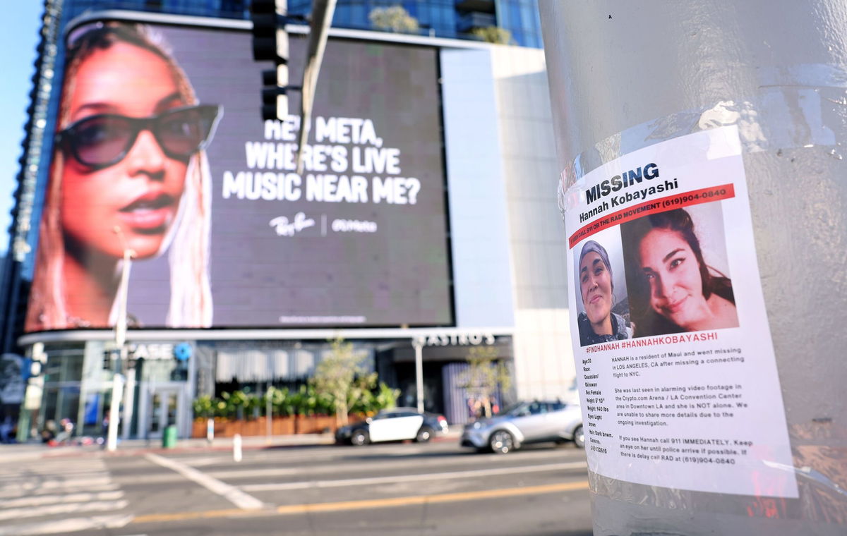 <i>Wally Skalij/Los Angeles Times/Getty Images via CNN Newsource</i><br/>Flyers of formerly missing Maui woman Hannah Kobayashi are on display outside Crypto.com Arena in downtown Los Angeles in late November.