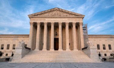 The afternoon sun shines on the US Supreme Court on August 25 in Washington