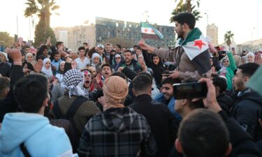 People dance and sing at the Umayyad Square