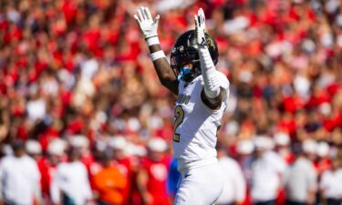 Hunter celebrates a touchdown against the Arizona Wildcats.