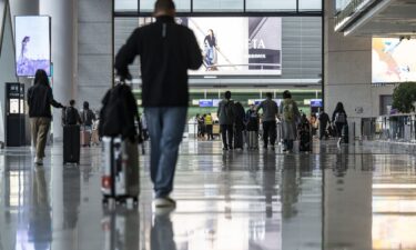 Travelers at Hongqiao International Airport in Shanghai