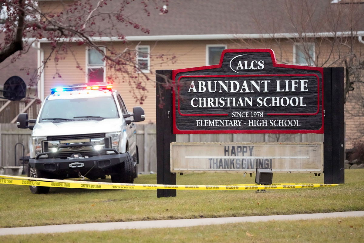 <i>Morry Gash/AP via CNN Newsource</i><br/>Emergency vehicles are parked outside the Abundant Life Christian School in Madison