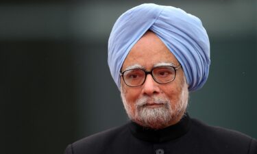 India's former Prime Minister Manmohan Singh arrives at the Chancellery on April 11