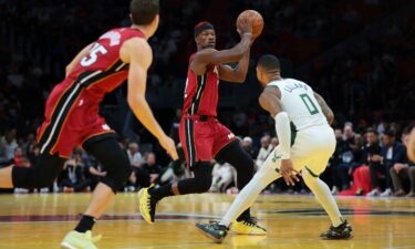 Miami forward Jimmy Butler (middle) will not be traded