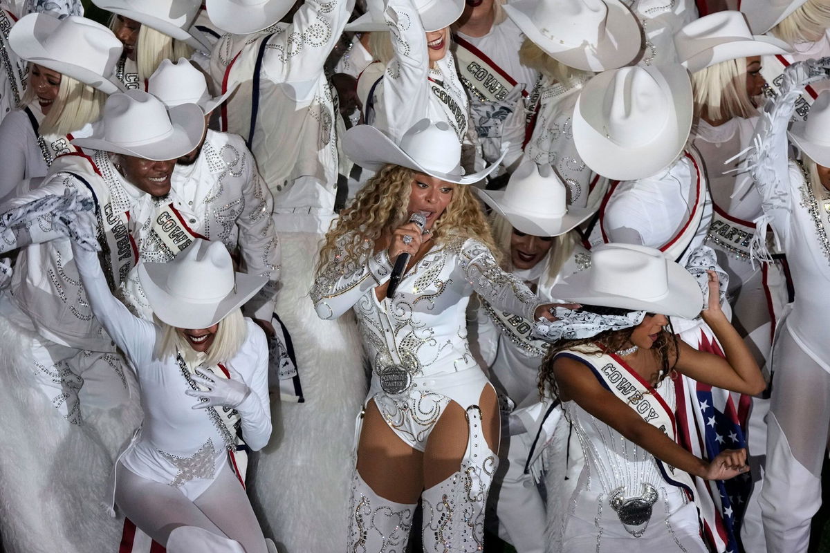 <i>Eric Christian Smith/AP via CNN Newsource</i><br/>Beyoncé performs alongside her daughter