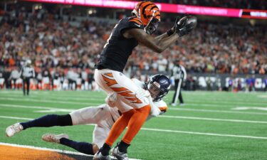 Tee Higgins of the Cincinnati Bengals catches the game-winning touchdown in overtime to defeat the Denver Broncos.