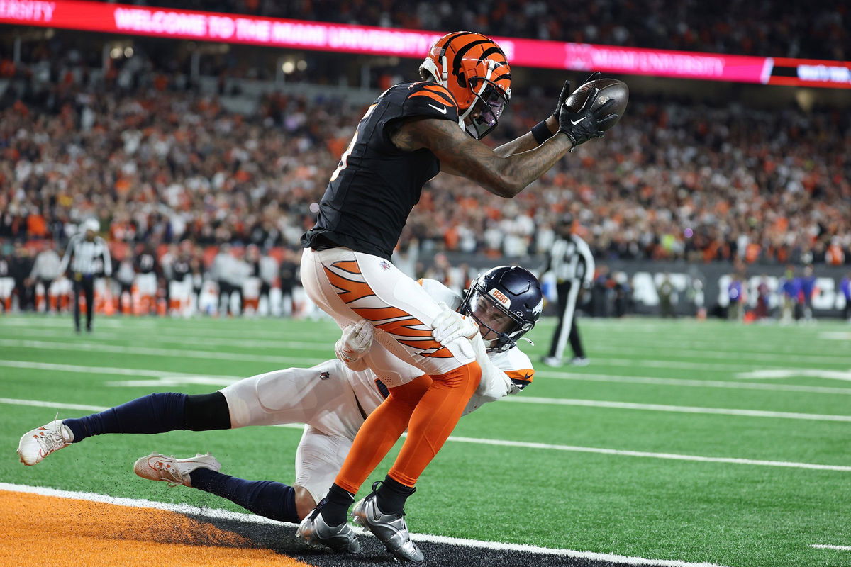 <i>Andy Lyons/Getty Images via CNN Newsource</i><br/>Tee Higgins of the Cincinnati Bengals catches the game-winning touchdown in overtime to defeat the Denver Broncos.