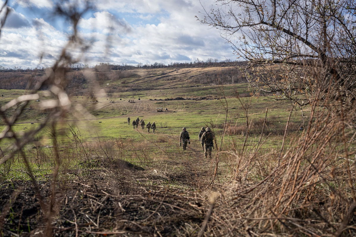 <i>Wolfgang Schwan/Anadolu/Getty Images via CNN Newsource</i><br/>Ukrainian servicemen are seen on a training exercise near the city of Pokrovsk on December 18.