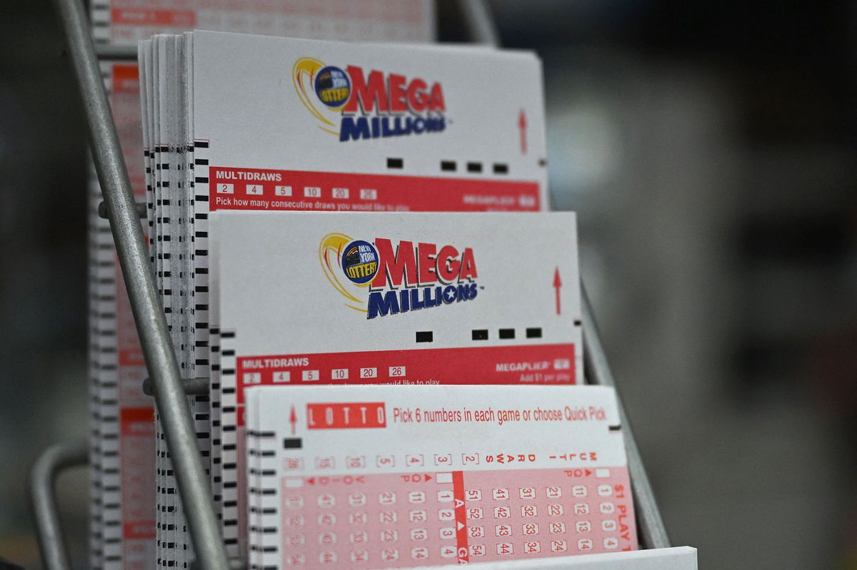 <i>Angela Weiss/AFP/Getty Images via CNN Newsource</i><br/>Lottery tickets for a Mega Millions jackpot of $1.58 billion are seen in a store in August 2023.