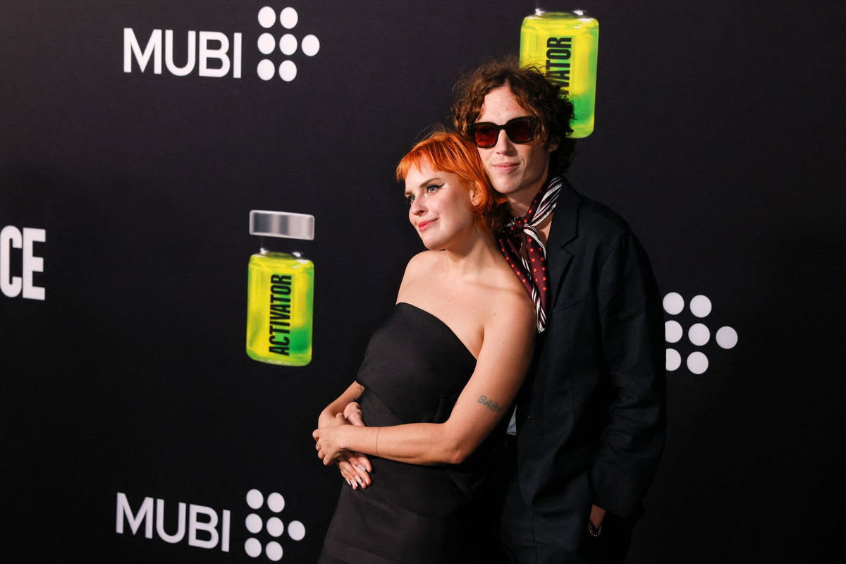 <i>Etienne Laurent/AFP/Getty Images via CNN Newsource</i><br/>Tallulah Willis (L) and Justin Acee attend the premiere of 