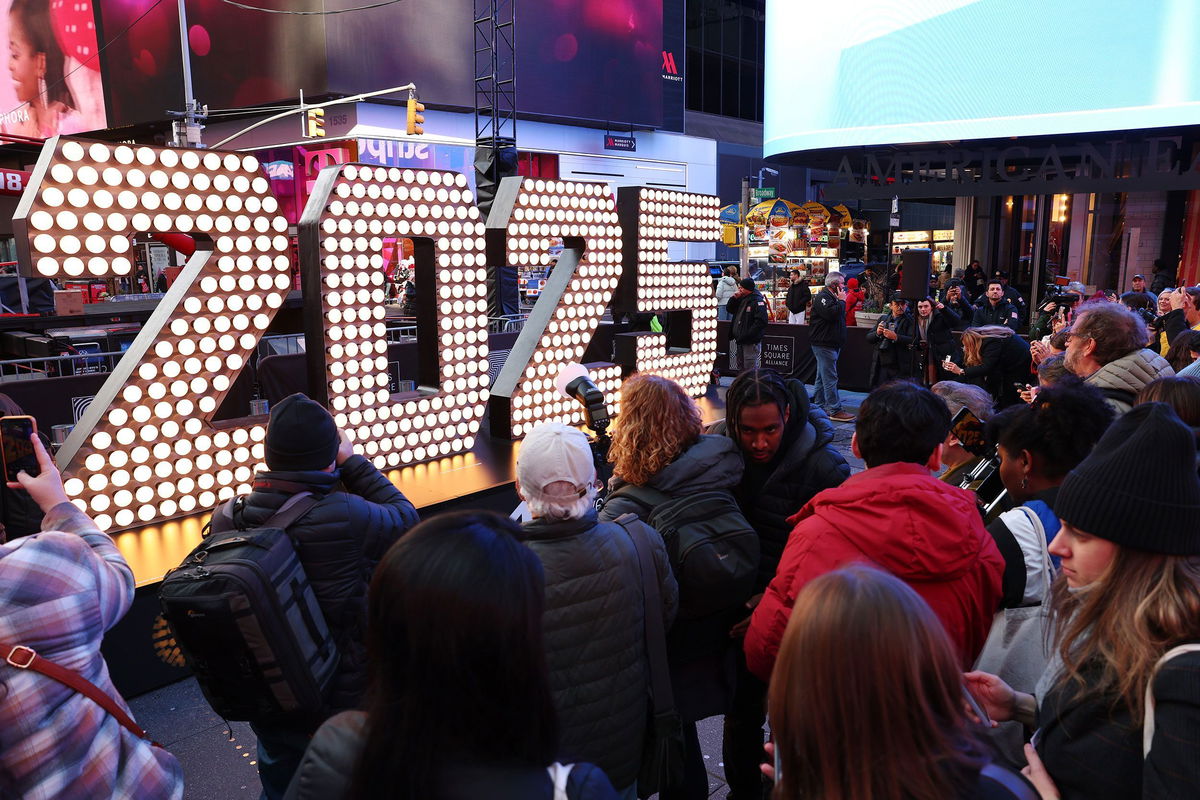 <i>Michael M. Santiago/Getty Images via CNN Newsource</i><br/>The 2025 New Year’s Eve numerals are seen on display in Times Square on December 18 in New York City. A quick-moving storm will race into the East on Tuesday and deliver potentially drenching rain anywhere from the mid-Atlantic to the Northeast.