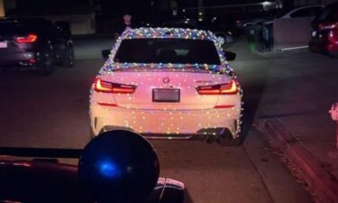 An East Bay CHP officer busts a decorated "mobile Christmas tree" on Interstate 880.