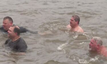 Hundreds of people jumped into freezing cold water along the Monongahela River in Pittsburgh on New Year's Day