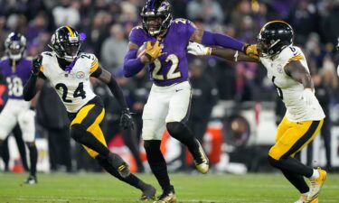 Ravens running back Derrick Henry breaks away from Steelers linebacker Patrick Queen and cornerback Joey Porter Jr. on his way to scoring a rushing touchdown.