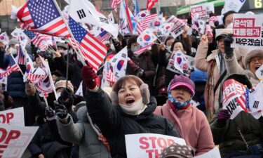 Supporters of impeached South Korean President Yoon Suk Yeol shout slogans during a rally to oppose his impeachment near the presidential residence in Seoul