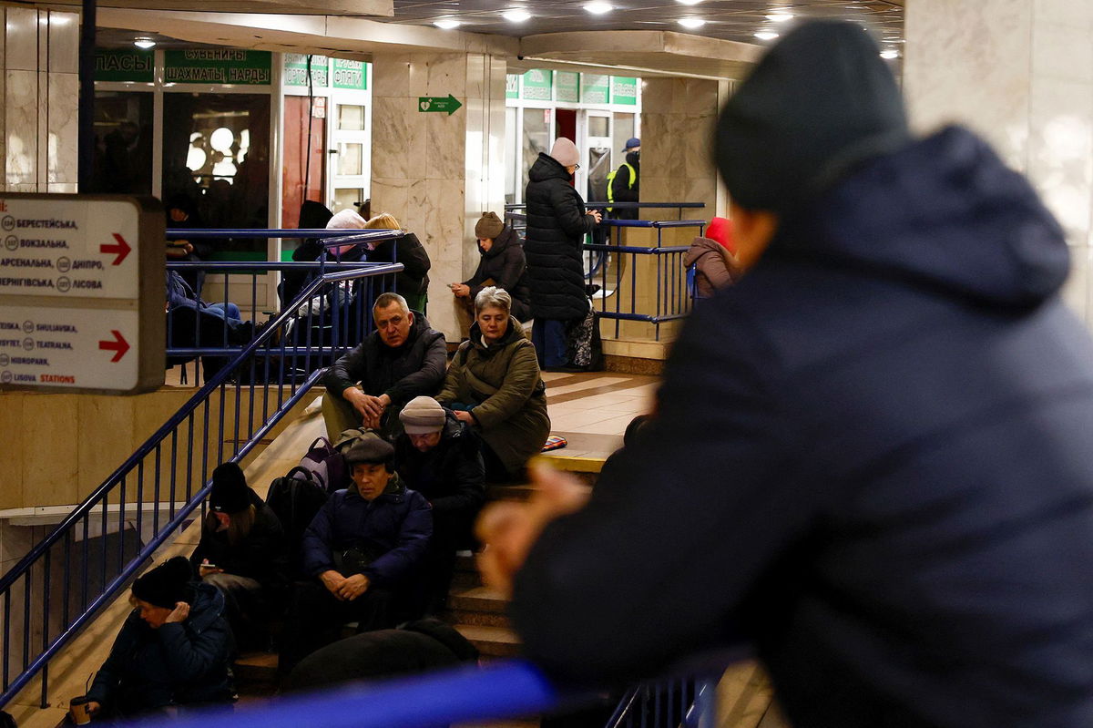 <i>Alina Smutko/Reuters via CNN Newsource</i><br/>People take shelter inside a metro station in Kyiv on January 15.