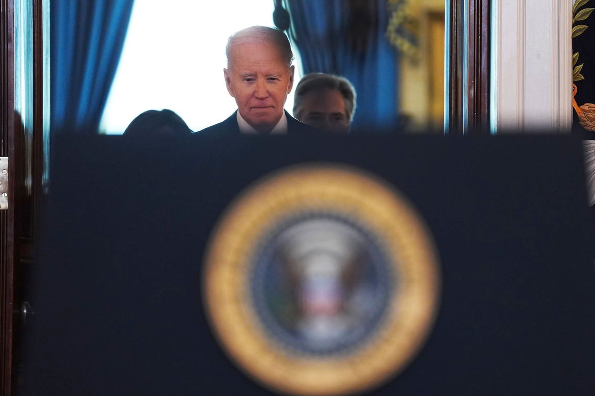 <i>Evan Vucci/AP via CNN Newsource</i><br/>President Joe Biden walking up to the podium to speak in the Cross Hall of the White House on the announcement of a ceasefire deal in Gaza.