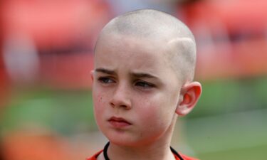 Cancer survivor Jack Hoffman is seen here before delivering a drug-free pledge during halftime of the University of Nebraska spring game in 2014. Hoffman has died of brain cancer at the age of 19.