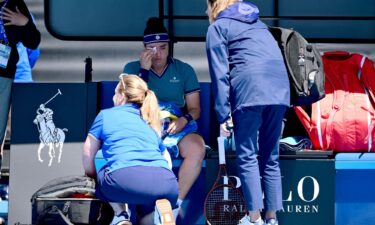 Jabeur receives medical attention in her second-round match at the Australian Open.