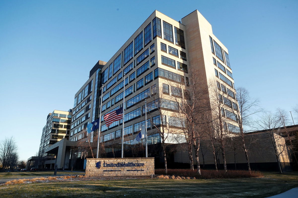 <i>Eric Miller/Reuters via CNN Newsource</i><br/>Flags fly at half-staff outside of the office of UnitedHealthcare