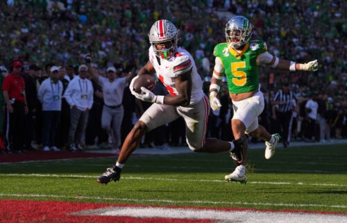 Ohio State wide receiver Jeremiah Smith scores a touchdown against Oregon.