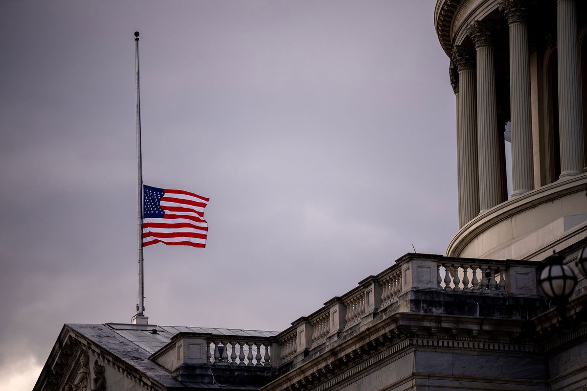 <i>Andrew Harnik/Getty Images via CNN Newsource</i><br/>A flag flies at half-staff for the death of former President Jimmy Carter at the US Capitol building on January 2.